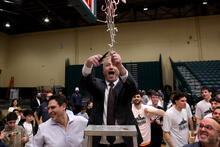 President Berman celebrates with the team.